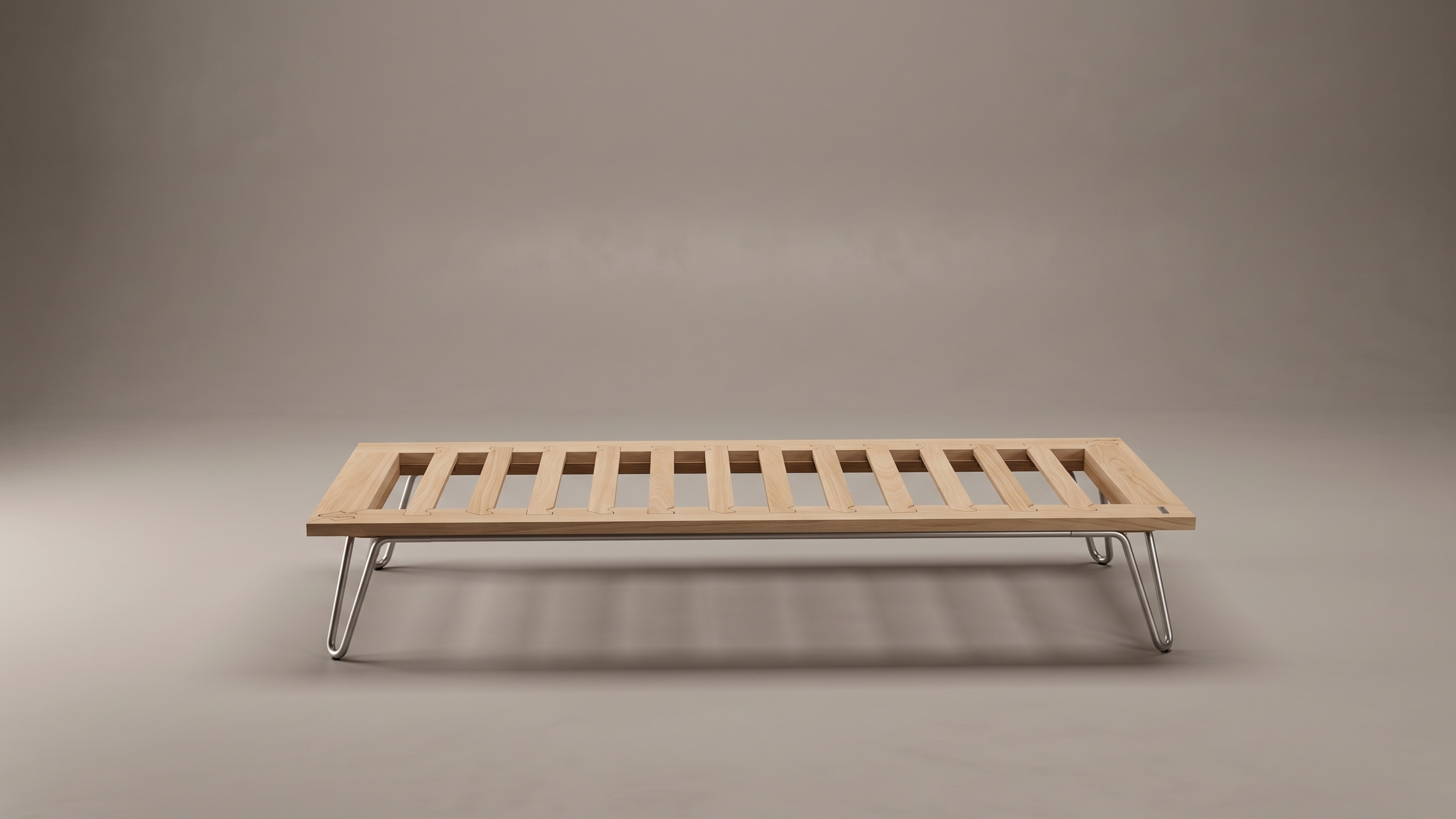 Frontal studio elevation of the Alpina bed base showcasing its low-profile timber frame and hairpin legs