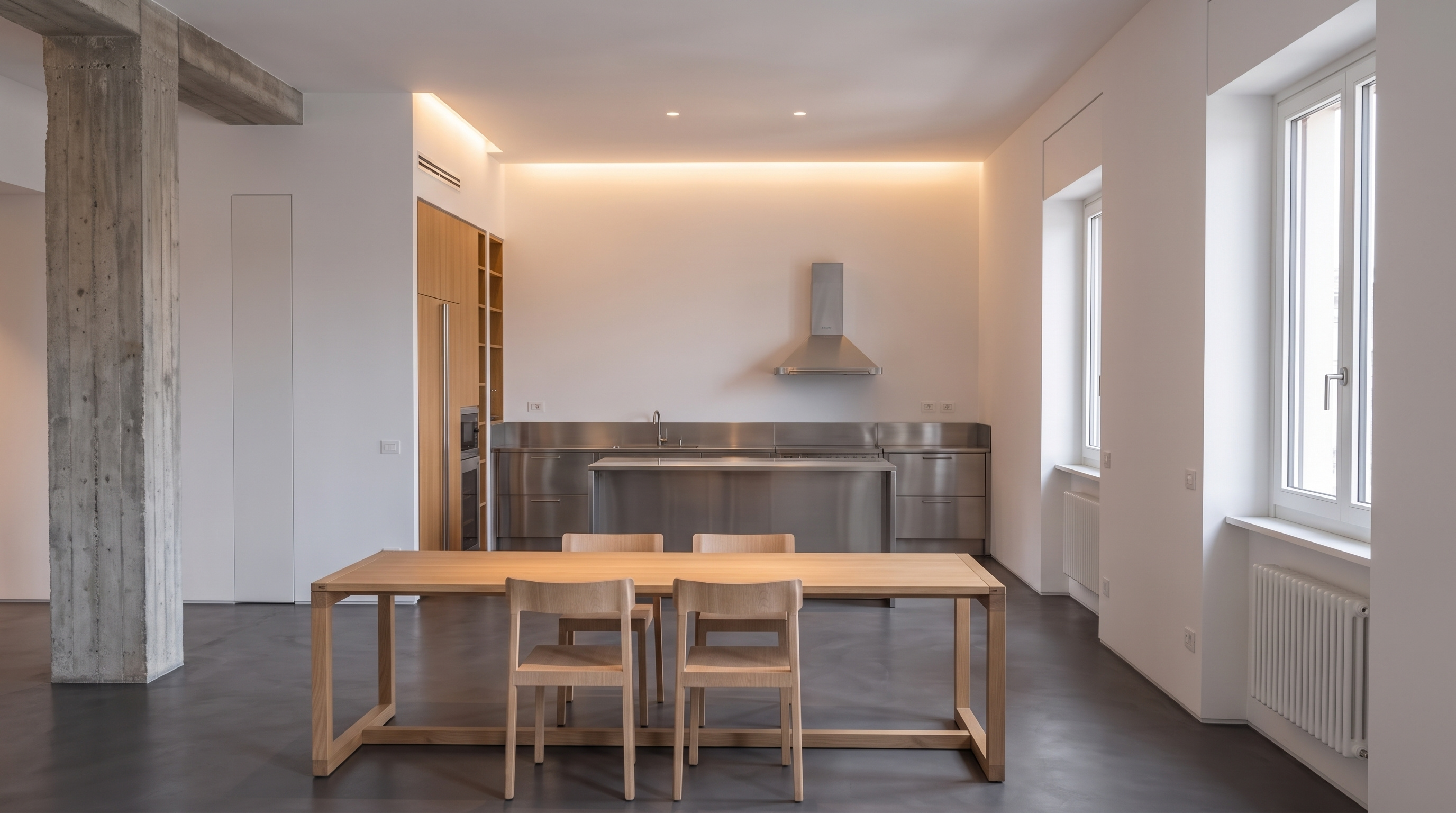 Detail of exposed concrete beams and Klein blue heating pipes against a bare wall