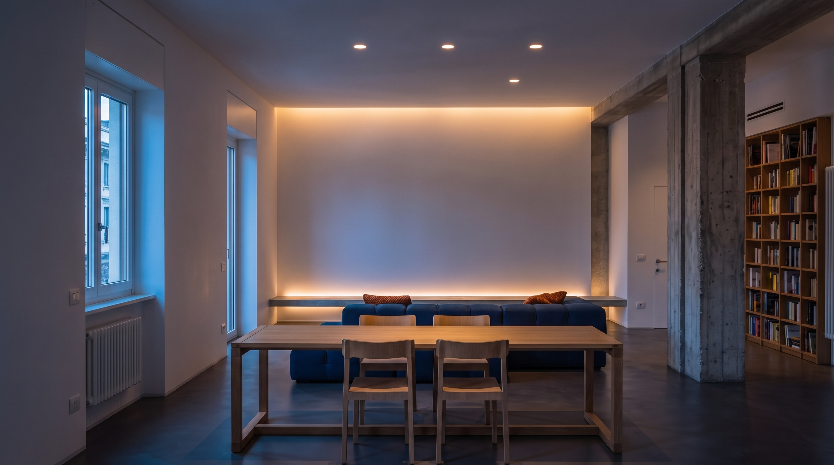 Microcement flooring holding natural light in the residential space